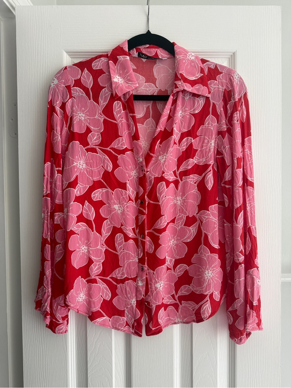 Zara Pink Floral Button-Down Blouse on Red Background